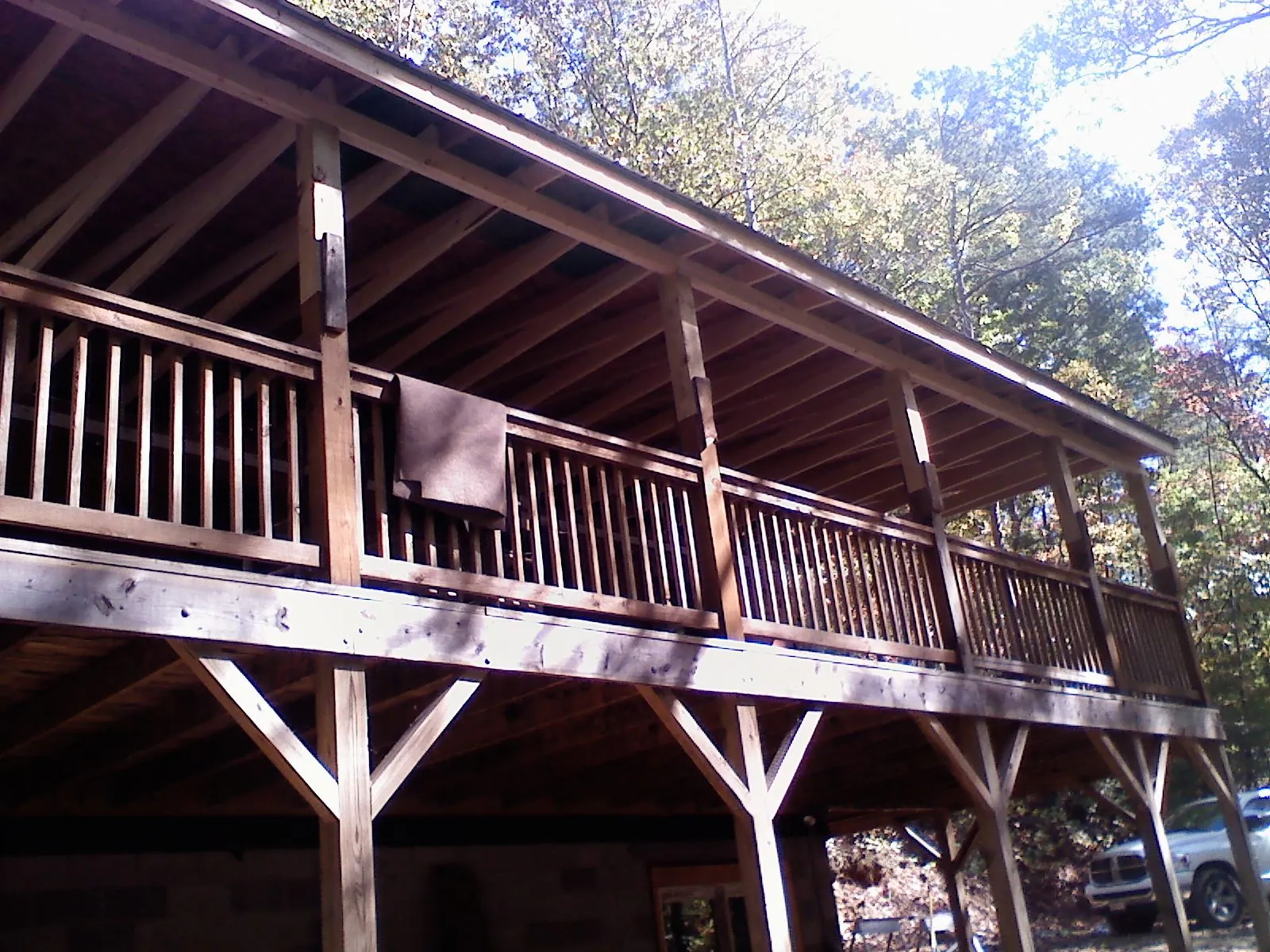 Timber framing under a new elevated porch and deck — Roof Leak Repair in West Hartford by Roofing Brothers